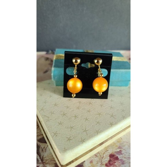 Celebrity Orange Dangling Clip-on Earrings - Picture 2 of 10